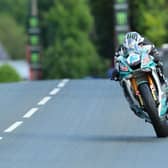 Michael Dunlop won Monday's opening Supersport race on his MD Racing Yamaha and set a new lap record at 129.45mph.