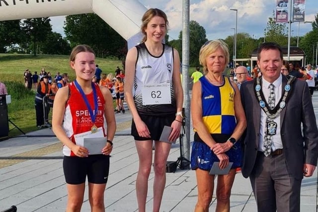 Rachel Hughes (left) on the 5k podium for second lady at the Craigavon Lake Run