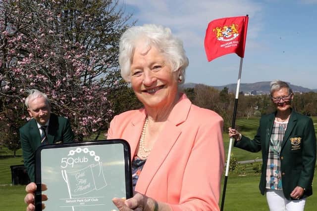 Belfastâ€TMs "Golden Girl", Lady Mary Peters, reflecting on the golf industryâ€TMs Gold Flag Award It was presented to Belvoir Park Golf Club by 59ClubUK, the market leader in Customer Service Analysis & Training.Celebrating on the putting green with her are club Captains Julie Morrison and Terry Sonner.use pic for free