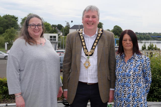 Cathy Adams and Catherine McCauley from Bee Heard pictured with the Mayor of Causeway Coast and Glens Borough Council Councillor Richard Holmes.