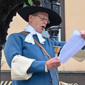 Carrick Town Crier Godfrey Robinson reading the official proclamation of the Platinum Jubilee events.