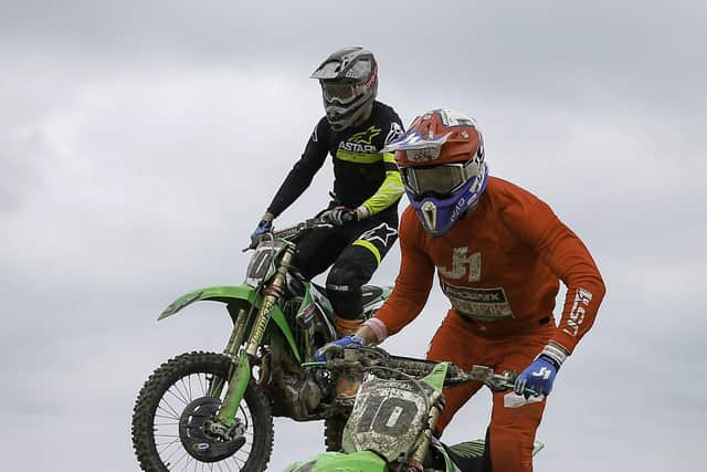 Loughbrickland brothers Jason (10) and John Meara (60) in action at round four of the Irish motocross championship at Gormanstown. Jason went on to claim the overall while John finished runner up.