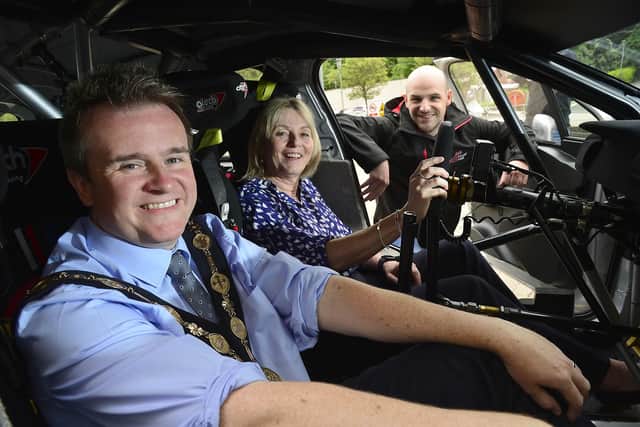 Mayor of Lisburn & Castlereagh City Council Alderman Stephen Martin and Alderman Amanda Grehan Development Committee Chair have a run through the controls of local competitor Jonny Greer's rally car. Jonny's family business Carryduff Forklift will sponsor the event