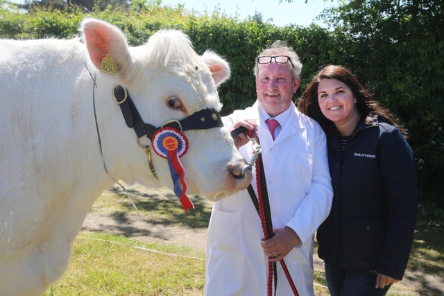 Harry Heron champion Charloais with Ruth Ritchie from Bank of Ireland pictured at Ballymoney Show on Saturday. PICTURE KEVIN MCAULEY/MCAULEY MULTIMEDIA
