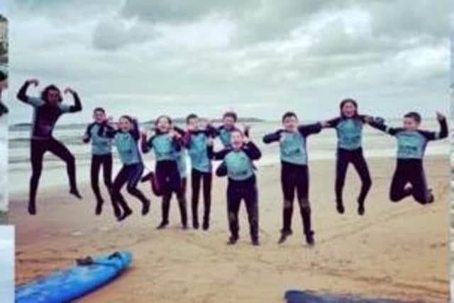 Pupils from St Patrick's PS in Portrush and Ballytober PS enjoyed surf lessons as part of a Shared Education programme