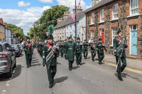 The Band of the Royal Irish Regiment lead the Standards and Members of the Royal British Legion through the streets of Royal Hillsborough. Pic by Norman Briggs, rnbphotographyni