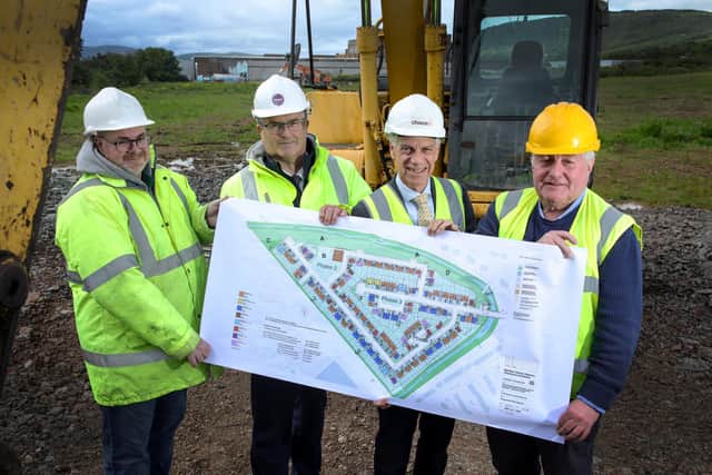 Unveiling plans for 146 new homes in Carrickfergus are, from left to right, Stephen Quinn, McGreevy Construction; Alastair McCaw, Choice Housing; Michael McDonnell, chief executive of Choice Group  and Peter Byrne from MHS Architects.