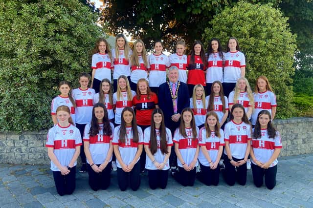 The Mayor of Causeway Coast and Glens Borough Council Councillor Richard Holmes pictured with the All-Ireland winning Derry Under-14 ladies football team