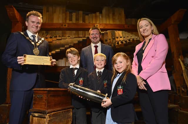 Outgoing Mayor Stephen Martin, Cllr Sharon Skillen and new Mayor Cllr Scott Carson were joined at the installation of the Time Capsule in the Irish Linen Centre and Lisburn Museum by pupils from Wallace Preparatory