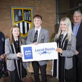 Roechama Stoel and Barry Spence, Dale Farm pictured with Dunclug College students Marc Graham, Kathryn Peachy and Samantha Brolly