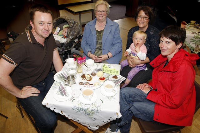 Chris Nelms, Dylan Nelms, Margaret Haughey, Tillie and Jenny Lundy, and Mary Nelms pictured during the Portstewart Hospice Support Group annual coffee morning and sale held at the Star of the Sea Parish Centre in September 2010