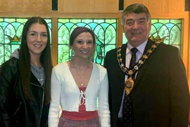 Jessica (left) and Amy with the Mayor of Mid and East Antrim, Alderman Noel Williams.