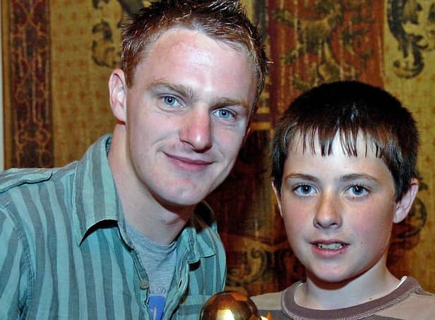 Coagh Youth U13 Player of the Year Mathew Rollins receives his award from Coagh Utd senior player Jamie Tomelty in 2007.