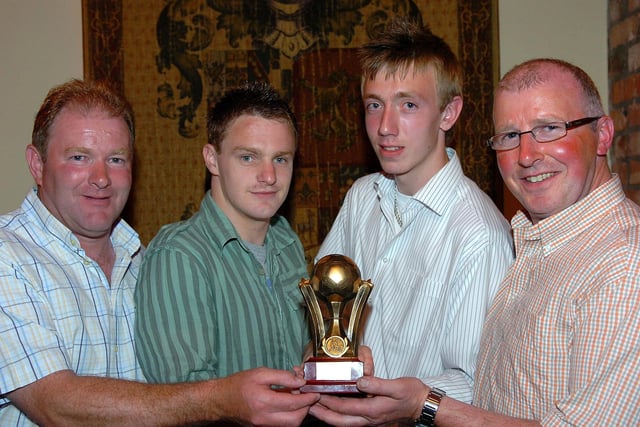 Coagh Youth U17 Player of the Year Willie Watson receives his award from Jamie Tomelty in 2007. Included in the picture are managers Alan Dallas and Barry Ramsey.