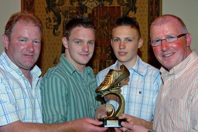 Coagh Utd Senior Player Jamie Tomelty presents the Coagh Youth U17 Top Goal Scorer award in 2007 to Stuart Dallas. Included in the picture are managers Alan Dallas and Barry Ramsey.
