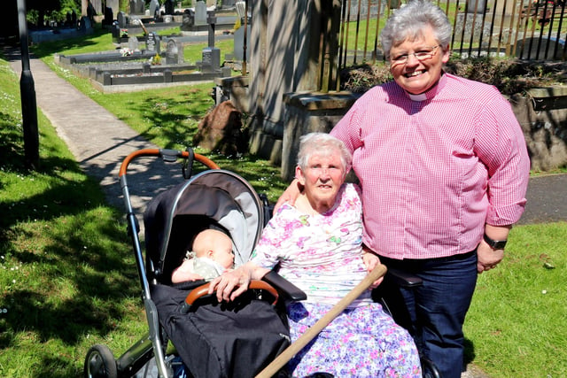 A tree planting ceremony was held in the grounds of Glenavy Parish to mark the Platinum Jubilee. Pictured are Charlotte Bingham (youngest in Parish), Molly Hamill (oldest in Parish) and Rev Linda Cronin
