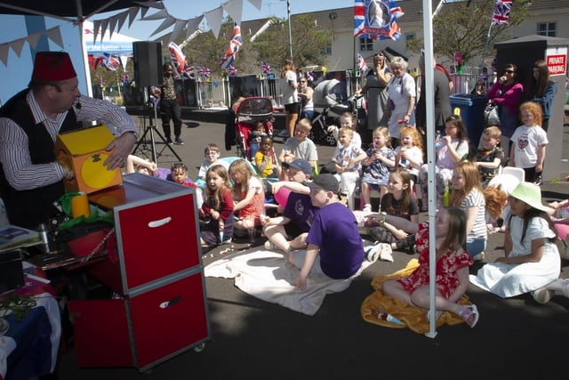 Children enjoying the puppet show during Saturdayâ€TMs Queenâ€TMs Jubilee Celebrations in the Fountain.