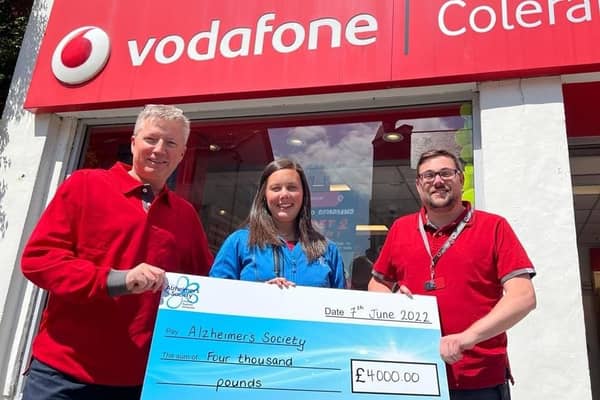 Stuart Roberts, Company Owner, Scott Drawmer, Assistant Store Manager, together with colleagues, family and friends climbed Slieve Donard and raised £4000 Alzheimer’s Society