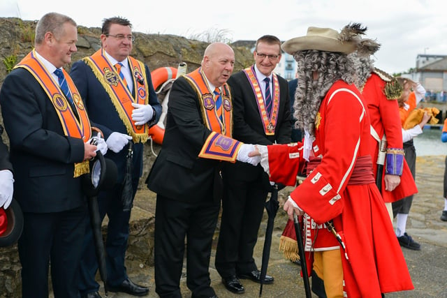 Members of the Orange Order greet King William III. Picture: Andrew McCarroll/ Pacemaker Press