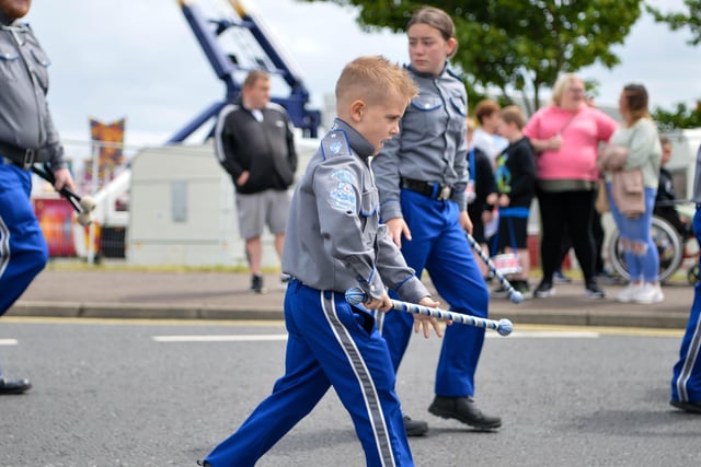 A young band member concentrates on the job in hand. Picture: Andrew McCarroll/ Pacemaker Press