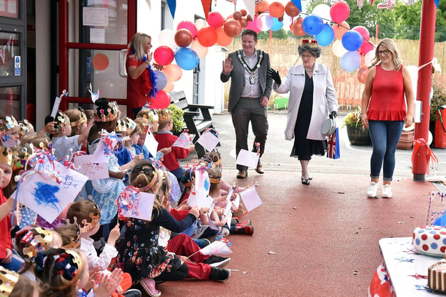 'The Queen' and Mayor of ABC Council, Councillor Glenn Barr paid a visit to Millington Nursery School for the School's Platinium Jubilee party on Tuesday. Also included is nursery assistant, Miss Ciara O'Brien. INPT22-219.