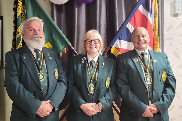 Larne Branch UDR Association officers - chairman Norman Gray (left), president Patricia Bresland and secretary Kenny Kirby at the Association Standards.