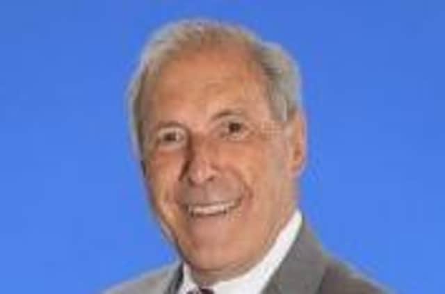 Cllr Uel Mackin proposed a wall be installed to include plaques