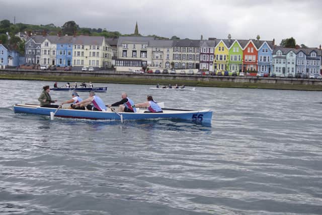 Rowers in action at a previous regatta in Whitehead waters.