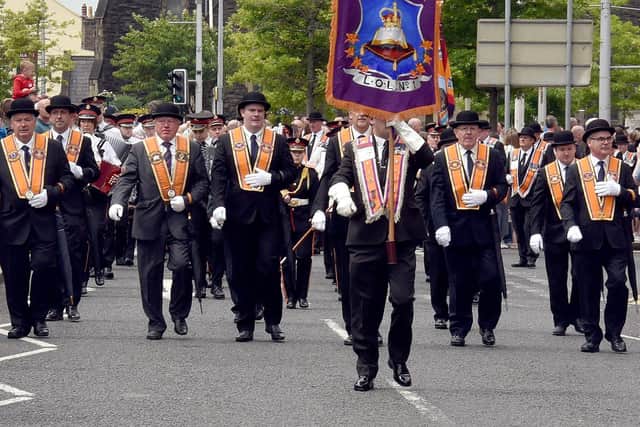 The head of the Twelfth parade makes its way through the Town Centre on Monday. INPT28-228.