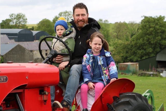 Finnis man John Fitzpatrick had two important passengers on his President tractor at the Dromara charity run - his four year old daughter Lexi and son Turlough (2).