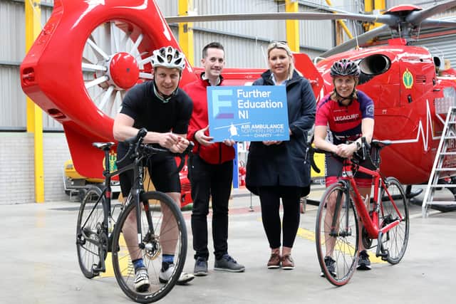 (Centre) Damien McAnespie, Fundraising Manager at Air Ambulance NI and Grace Neville, Collaboration Manager at Northern Ireland’s Further Education Colleges, pictured with members of the SERC ‘Further Education 400’ team, Andrew Megarry and Claire Henderson
