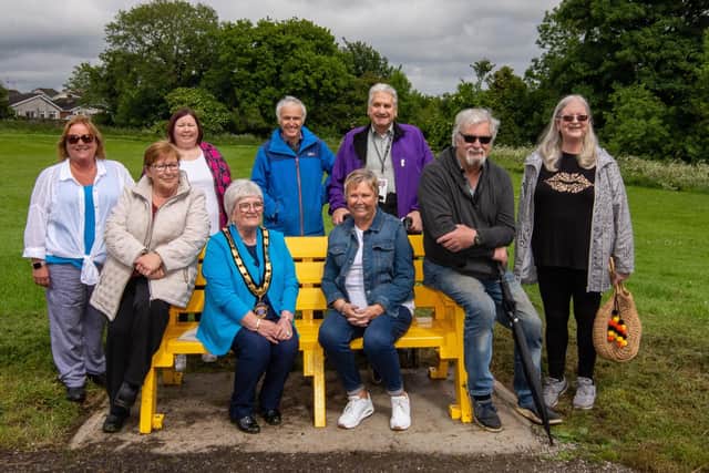 Mid & East Antrim Deputy Mayor Beth Adger and Marjorie Hawkins, Chair of the M& East Antrim Loneliness Network with Debbie Chestnutt, Sadie Peachey, Elizabeth Peachey, Stuart Lloyd, Dessie Arthur, Jim Leetch and Hazel Leetch of Good Morning Ballymena, at the launch of the Chatty Bench at Sentry Hill Park, Ballymena.