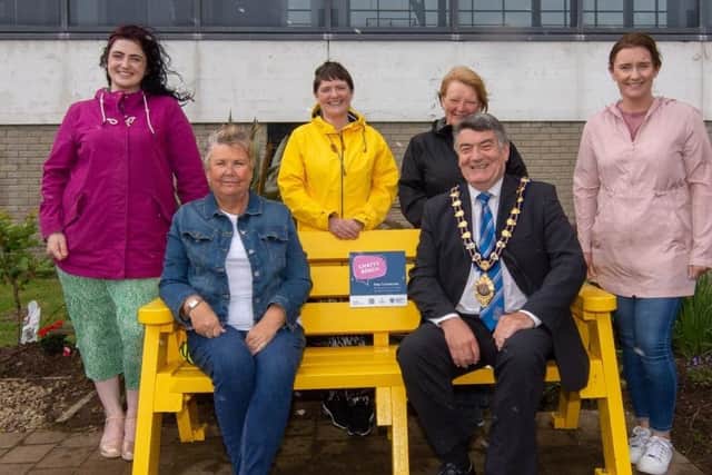 Pictured with the Mayor of Mid and East Antrim is Larne community garden & community fridge volunteers at Larne Promenade.