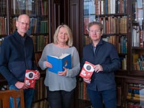 Michael Hewitt, Managing Director of DoubleBand Films, Michele Devlin, Director of Docs Ireland, and Dermot Lavery, Managing Director of DoubleBand Films in the Linen Hall Library, Belfast.