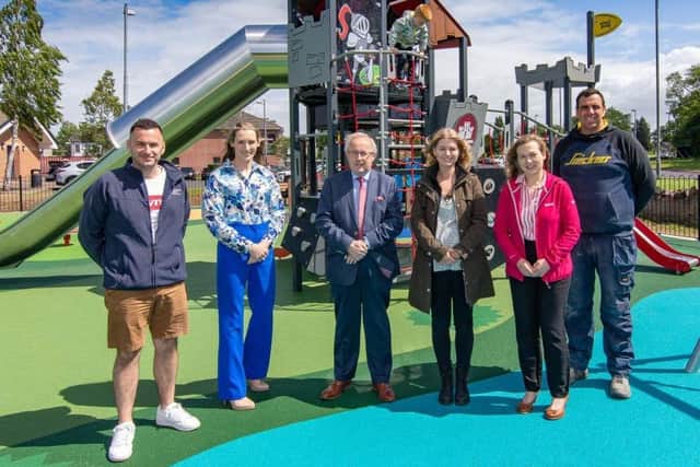 Elected members, Council staff and Emma Ervine of Haffey Playgrounds at the opening of the replacement play park at the River Maine, Galgorm