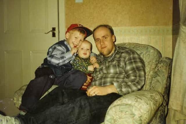 David Johnston with his two boys, Louie and Joshua. Constable Johnston was murdered in Church Walk, Lurgan 25 years ago.