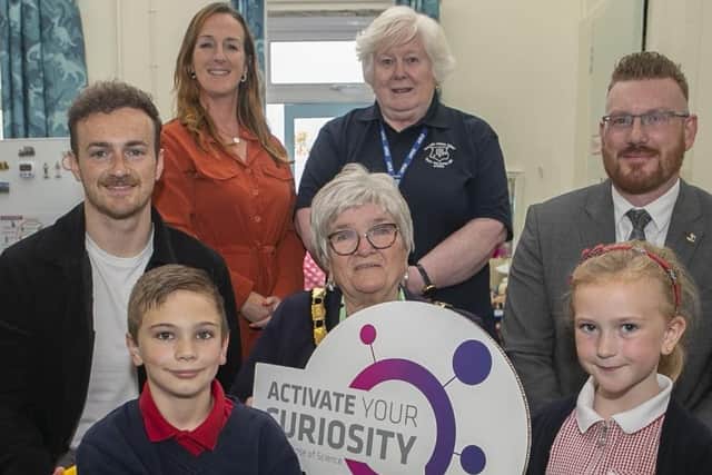 Back row L-R: Christine Barnhill, Economic Development Officer, Mid and East Antrim Borough Council and Lesley Meikle, Principal of Harryville Primary School.  Middle Row L-R: Ryan Sands, Class Teacher, Deputy Mayor Councillor Beth Adger MBE and Darren Leslie, Business Development Manager at PAC Group.  Front  L-R: Noah Steele and his sister Lily Steele.