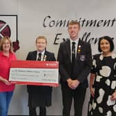 Cullybackey College Principal Mr David Donaldson at the hand over of a cheque for £1236 to Wendy Pickering (NI Air Ambulance) by Alix Ross - Head Girl and William Hammond - Head Boy, (Right) Mrs Pamela Surgenor