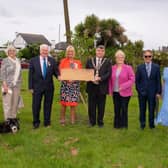 Pictured is The Deputy Lord-Lieutenant of County Antrim, Mrs Jackie Stewart MBE and Mayor of Mid and East Antrim, Alderman Noel Williams with the volunteers of Brighter Whitehead, Led by Bill Pollock at the plaque unveiling, in Whitehead.