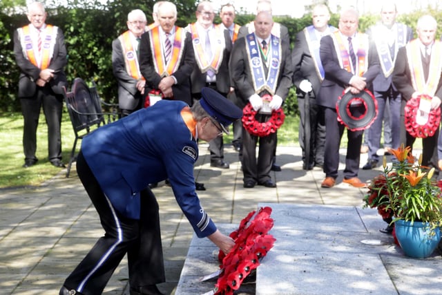 Annie Mary Dobbin lays a wreath during the Derrykeighan Guiding Star LOL 995 service of remembrance at Dervock War Memorial on Sunday