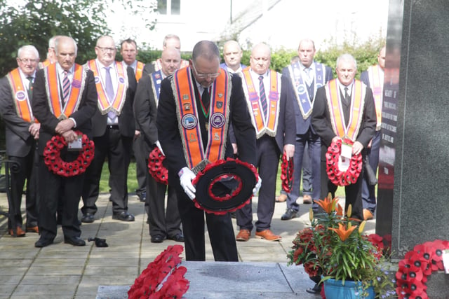 Brothr Mark Heaney lays a wreath pictured during the Derrykeighan Guiding Star LOL 995 service of remembrance at Dervock War Memorial on Sunday