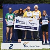 Left to right are Lauren Hassett of PwC, Kirsten Gowdy of Hughes Insurance, Craig Newell of Liberty IT, Lady Mary Peters and Janelle Hanna of Hughes Insurance at the recent inaugural Mary Peters Trust corporate games