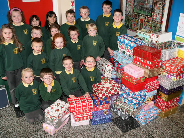 Pupils from St. Brigid's PS (Ballymoney) with a selection of their shoe boxes for the Road of Hope charity. BM48-601AC