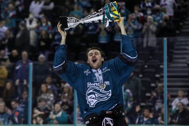 Belfast Giants' Sam Ruopp celebrates winning the Challenge Cup last season. The Giants have confirmed that Ruopp is to return to Belfast for a second season. Picture: William Cherry/Presseye