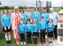 Baroness May Blood pictured with artist Shauna McCann, principal Denise Macfarlane and pupils at the Corran Integrated Primary School garden.
