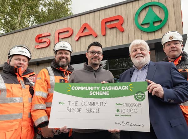Members of The Community Rescue Service being presented with £10,000 grant at SPAR Milltown Rd. (L-R) Search Technician Murrough McDonagh, District Commander Barry Torrens, SPAR Milltown Rd Store Manager David Buckley, Regional Commander Sean McCarry, Assistant Unit Commander Ruari Bailey