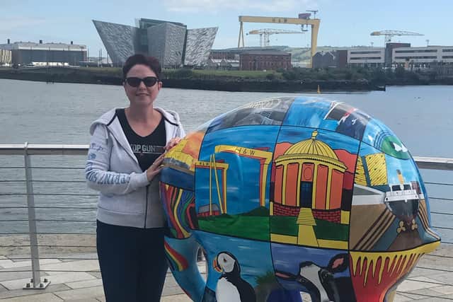 Julie pictured with the Elmer she decorated.