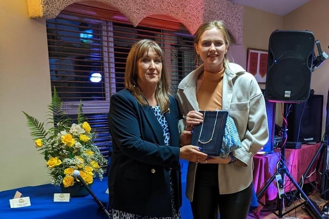 Lady Captain Jane Clarke (left) presents Abigail Edwards with her third prize