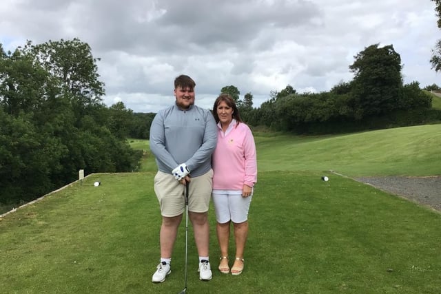 Lady Captain Jane Clarke with her son Jacob prior to teeing off