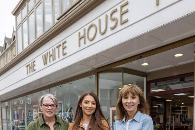 Ulster Stores staff Claire Huston, Abigail Holmes and Phil Bray outside the newly refurbished White House in Portrush